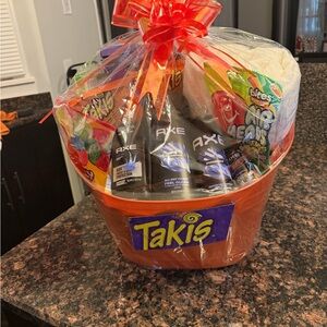 Orange Gift Basket with Axe Products and Snacks